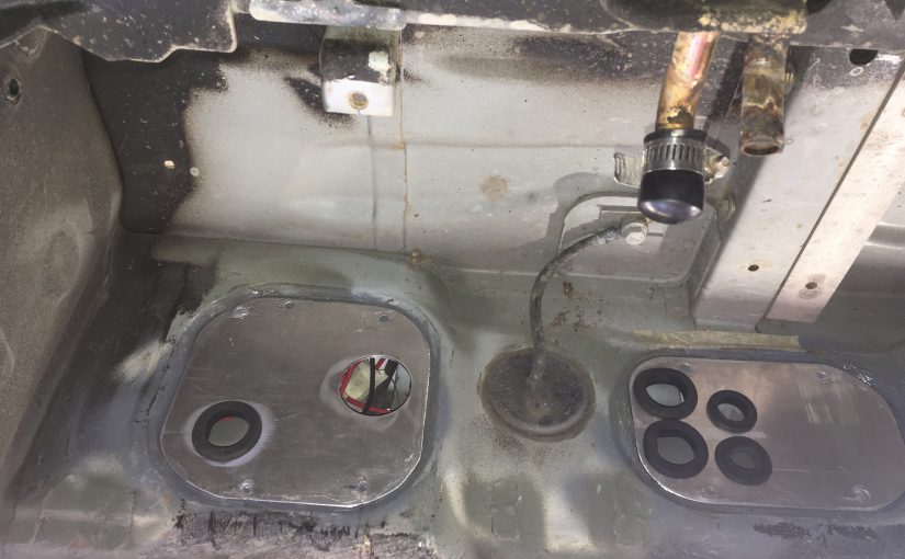 Holes in van wall for hoses and water lines. Espar Diesel Heater Van Install