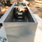 The Espar & Elgena Aluminum Box Dry fitting the Elgena, Espar and all the hosing to determine where to cut holes.