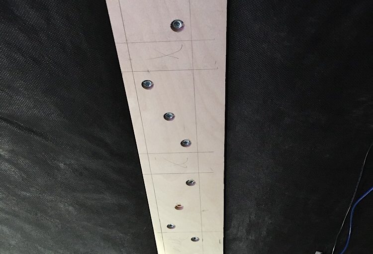 Wood stringer screwed into the metal cross beams. Wood ceiling installation for Mitsubishi Delica L300